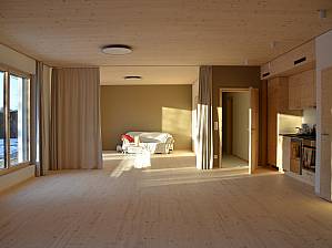 Timber in the basement creates comfortable spaces for various uses