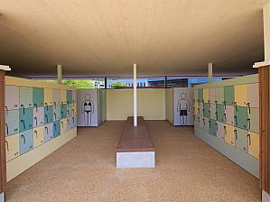 Wardrobe area with visible ceiling